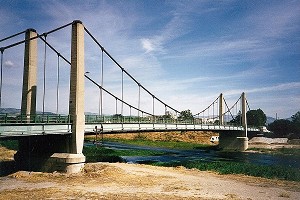 Self-anchored suspension bridges