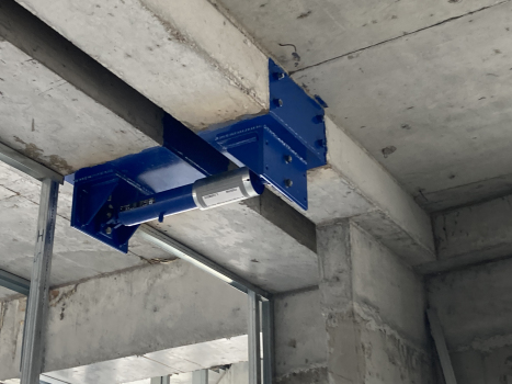 One of the four hydraulic dampers to protect the narrow building core against tilting