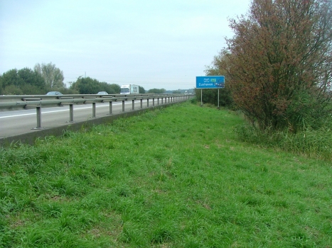 The bog crossing for the A 27 Motorway near Bremerhaven appears like a causeway because of the low embankments on either side. : The bog crossing for the A 27 Motorway near Bremerhaven appears like a causeway because of the low embankments on either side.