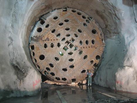 Head of the S-210 Tunnel boring machine used to excavate the eastern tube of the Gotthard Base tunnel between Bodio and Faido, Canton Ticino, Switzerland (all roll chisels have already been removed, picture taken 10 days after breakthrough into multi-function station Faido, 2000 m of rock overhead, diameter is 8.80 m, length of the TBM is 400 m)
