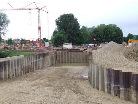 Brunstatt (68/Alsace): Construction d'un passage routier sous le Canal du Rhône au Rhin. Aménagements de la pente d'accès côté Nord-Ouest/Mulhouse
