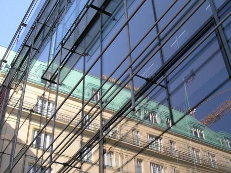 Reflection of the Adlon Hotel in the fassade of the Academy of Arts in Berlin