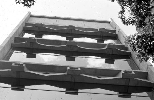 Caracas Art Museum In this view looking upward along the facade, exposed concrete boxes mark the anchorages of the prestressing cables. The indentations of the edges of the slabs are expressive of the manner in which compressive forces radiate from the anchorages