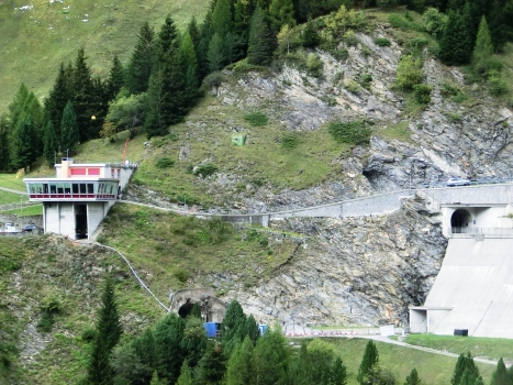Luzzone Tunnels and Luzzone Dam Tunnel : On the left, Luzzone I Tunnel eastern portal; on the right, (up to down) Luzzone II and Luzzone III Tunnels eastern portals and Luzzone Dam Tunnel northern portal