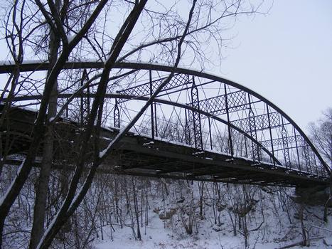 Located over the Le Seuer River on Twp. Rd. 190 in Mankato Twp. near Skyline. Built in 1873 by the Wrought Iron Bridge Company of Canton, OH, the 190 ft. long bridge is the longest of its type in the USA and the second longest in the world