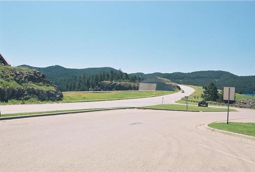 Pactola Dam - View of the roadway on top of the dam. The spillway is in the background