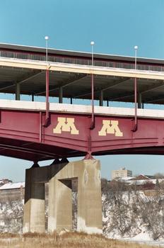View of the Washington Avenue Bridge. The «M» is for the University of Minnesota. The bridge also connects the campus which stradles both banks of the Mississippi River