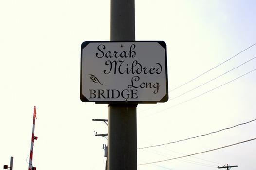 Plaque with the naming of the bridge, as seen on the Kittery side