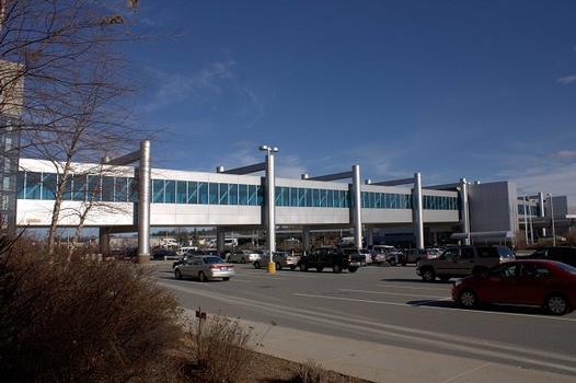 An elevated pedestrian walkway connecting the terminal and the parking garage, Manchester Airport, N.H
