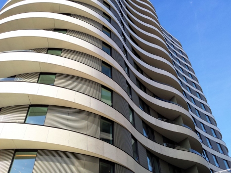 The balconies help to create a continuous organic shape.