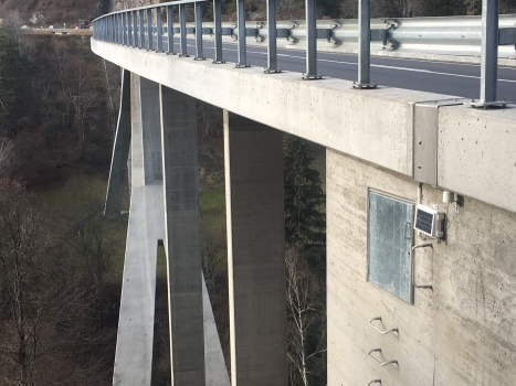 The heart of the SHM system, installed externally at one abutment of the Lavoitobel Bridge, complete with integrated solar panel on its cover for power supply and a separate weather sensor