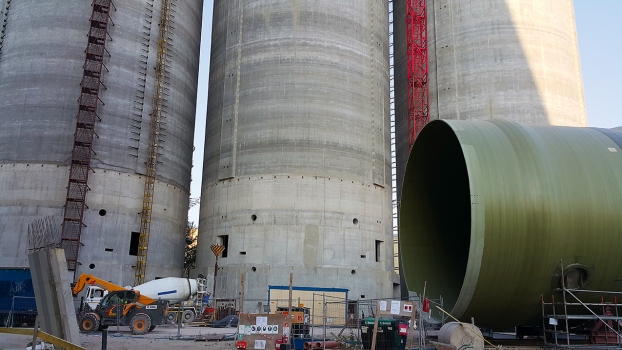The three identical fly ash tanks for the 11th generator.