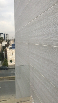Not backlit, light concrete looks like natural stone. The concrete is matched in color to the façade of the bank.
: Not backlit, light concrete looks like natural stone. The concrete is matched in color to the façade of the bank.