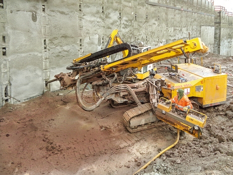 At Mittnacht Street Station, the excavation was stabilized using about 13 km of temporary, grouted strand anchors.
: At Mittnacht Street Station, the excavation was stabilized using about 13 km of temporary, grouted strand anchors.