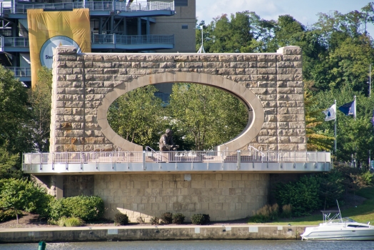 Pier of the demolished Manchester Bridge in Pittsburgh. The pier has been hollowed out to provide a background for the Fred Rogers memorial.