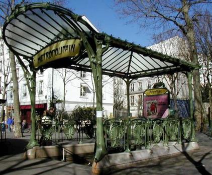 Entrance to the Paris metro at Place des Abbessess by Hector Guimard