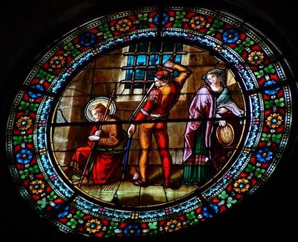 Eglise Saint-Jean-Baptiste, Mézin : Vitrail de la rose occidentale sur la martyr de saint Jean Baptiste de 1886