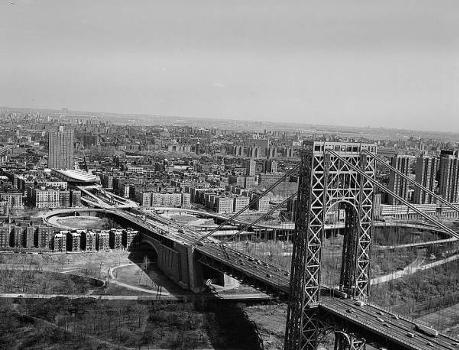 George Washington Bridge: 
General view of New York tower with approach and Manhattan in background 
(HAER, NY,31-NEYO,161-11)