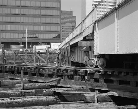 Detail, southwest span, roadbed, stringers, girders. - Summer Street Retractile Bridge, Spanning Fort Point Channel at Summer Street, Boston, Suffolk County, MA (HAER MASS,13-BOST,87–19)