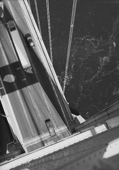 West side of east tower:Camera pointed straight down for the benefit of acrophobics; note extremely turbulent water from current (HAER WA-99-9)
