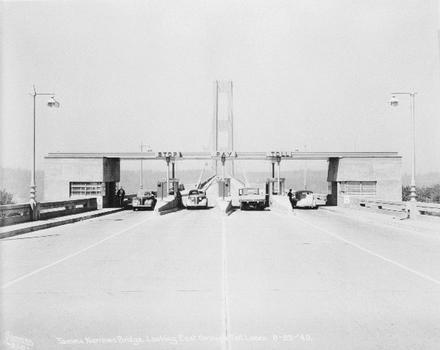 Tacoma Narrows bridge, looking east through Toll lanes, 29 august 1940. (Eldridge, Clark H. "Tacoma Narrows Bridge, Tacoma, Washington, Final Report on Design and Construction," 1941) (HAER WA-99-30)