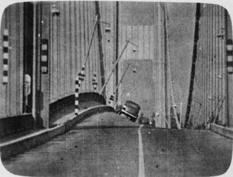Vertical and torsional motion from east tower Showing angular distortion approaching 45 Degrees with lamp posts appearing to be at Right angles, 7 November 1940, from 16mm film Shot by Professor F. B. Farquharson, University of Washington. ("Laboratory studies on the Tacoma Narrows Bridge, at University of Washington" [Seattle: University of Washington, Department of Civil Engineering, 1941]) (HAER WA-99-35)