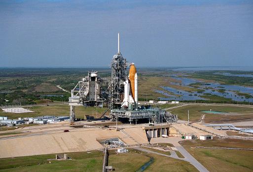 Vehicle Assembly Building (VAB) : Aerial view showing Space Shuttle Columbia at Launch Pad 39B following rollout from the Vehicle Assembly Building; Columbia is being prepared for Mission STS- 75.
