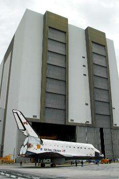 Vehicle Assembly Building (VAB): Endeavour is towed in front of the Vehicle Assembly Building (VAB) where it is going for temporary storage. The orbiter has been moved from the Orbiter Processing Facility (OPF) to allow work to be performed in the OPF that can only be accomplished while the bay is empty. Work scheduled in the OPF includes annual validation of the bay's cranes, work platforms, lifting mechanisms and jack stands. Endeavour will remain in the VAB for approximately 12 days, then return to the OPF.
