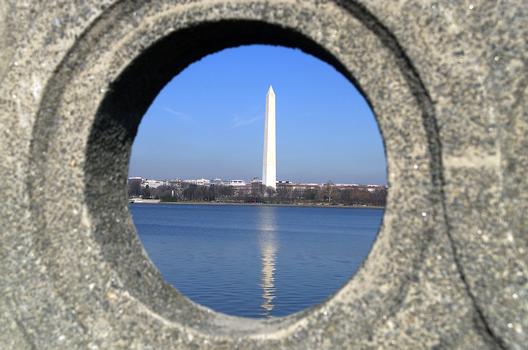 A view of the Washington Monument as seen through a porthole from the bridge near the Jefferson Memorial, in Washington, DC