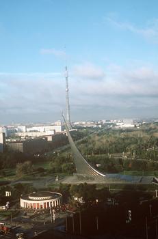 An elevated view of the Yuri Gagarin Monument devoted to the achievements of the Soviet people in space exploration. Behind the monument the Moscow television tower (tallest reinforced concrete structure in the world) can be seen. The circular building in the foreground is one of the stations of the Moscow subway system
