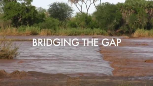 Bridging The Gap:The Galana River. A meandering, flood-prone channel in eastern Kenya filled with crocodiles and hippos. Each year there are countless deaths due to crocodile and hippo attacks, especially among children. Flash floods are also a constant threat to the local people of the Galana river region.
Bridging The Gap is a non-profit organization that builds footbridges for marginalized communities across Sub-Saharan Africa. Derek Roulston, of the Presbyterian Church of East Africa, approached Bridging The Gap with a request for a bridge over the Galana. This bridge would connect an elementary school and clinic on the north side of the river with the main highway and agricultural lands on the south side.
Harmon Parker, Bridging The Gap’s founder and director, along with professional engineer Chris Rollins, found the Helvetas suspension footbridge design to be most suitable for the surveyed region, known as Bombi.
Together, with Bridging The Gap’s welder and construction supervisor Sylvester Ouko, Bridging The Gap worked with a team of dedicated local workers from Bombi to set about building the first suspension footbridge of this kind ever attempted in East Africa.
This is the story of the Bombi Community Footbridge.
Written, directed, and edited by Justin Edwards.
www.bridgingthegapafrica.org