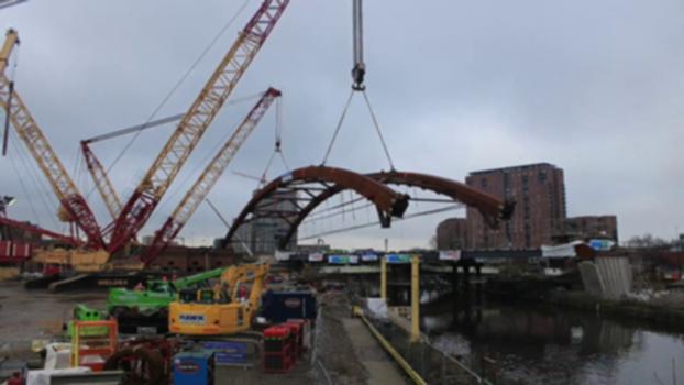Time lapse of Ordsall Chord arch lift. 21 Feb 2017:On Tuesday 21 February 2017, teams from Network Rail, Skanska Bam and Severfield added to the Greater Manchester skyline as 600 tonnes worth of steel arch was lifted over the River Irwell and positioned on a new bridge.
The bridge will form the centre piece of the Ordsall Chord, part of the Great North Rail Project. Once completed by December 2017, the chord will provide new direct links to Manchester airport from across the north, reduce congestion at Manchester Piccadilly and connect Piccadilly and Manchester Victoria station for the first time.
For further information, you can find out more on https://www.networkrail.co.uk/ordsall or follow our Twitter account https://twitter.com/networkrailnp
For all our national news, campaigns and to see how we're at the heart of revitalising Britain’s railway, please follow:
http://www.facebook.com/networkrail
http://www.instagram.com/networkrail
http://www.linkedin.com/company/network-rail
http://twitter.com/networkrail
http://www.youtube.com/networkrail