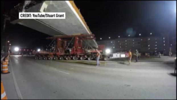 Time lapse of FIU bridge installation:Views from road and from a camera the bridge during the move on March 10, 2018.