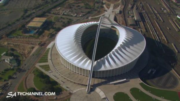 Moses Mabhida Soccer Stadium With Aerial Shots : Named after a hero of the working class, the Durban Kwazulu-Natal Moses Mabhida Stadium lies adjacent to the ABSA Stadium in the Kings Park Sporting Precinct - a site located in Stamford Hill, is yet to be another world class multi-purpose stadium set to make history in the making of the 2010 Fifa World Cup. The iconic arch above the 70 000 - seater stadium was termed an engineering miracle by the CEO of the 2010 FIFA World Cup organising committee, Danny Jordaan. The highest point of the arch is 106m above the middle of the pitch and consists of 56 separate 10m pieces weighing 3500 tons
Produced by Tekweni Media. @Tekweni