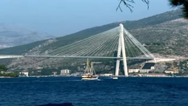 DYWIDAG Stay Cable Systems for Dubrovnik Bridge, Croatia : The Dr. Franjo Tudjmann Bridge near Dubrovnik in Croatia, which has an overall length of 481.4 m, is suspended from the 143 m high pylon by 19 pairs of Stay Cables that were supplied by DSI. Especially in winter, the bridge is subjected to extreme storms. Therefore, adaptive cable dampers were installed that work according to the principle of magnetorheological (MR) fluid dampers. The electronic control significantly reduces the oscillation amplitudes. Thus, the oscillation behavior of the entire bridge is positively affected, increasing both the service life of the stay cables and traffic safety. The dampers were developed by DSI, Maurer & Söhne GmbH & Co KG and the Swiss research institution for material science and technology, Empa.
For further information on this project visit: https://www.dywidag-systems.com/emea/projects/2007-info-15/cable-vibration-dampers-secure-one-of-the-largest-stay-cable-bridges-in-europe/