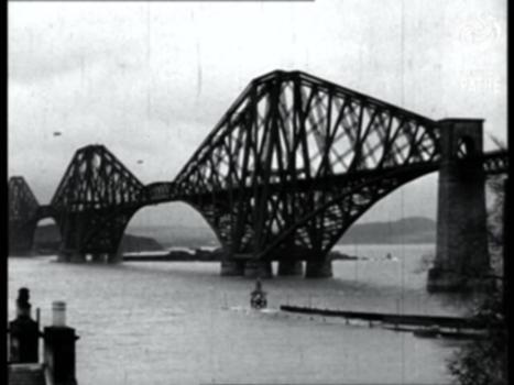 Forth Bridge (1940):Unused / unissued material - dates unclear or unknown.
Various shots of the Forth Bridge in Scotland. Barrage balloons are floating above it.
A man and woman come out of a building and gave up to the air. 
More shots of the Forth Bridge. 
FILM ID:588.05
A VIDEO FROM BRITISH PATHÉ. EXPLORE OUR ONLINE CHANNEL, BRITISH PATHÉ TV. IT'S FULL OF GREAT DOCUMENTARIES, FASCINATING INTERVIEWS, AND CLASSIC MOVIES. http://www.britishpathe.tv/
FOR LICENSING ENQUIRIES VISIT http://www.britishpathe.com/
British Pathé also represents the Reuters historical collection, which includes more than 136,000 items from the news agencies Gaumont Graphic (1910-1932), Empire News Bulletin (1926-1930), British Paramount (1931-1957), and Gaumont British (1934-1959), as well as Visnews content from 1957 to the end of 1984. All footage can be viewed on the British Pathé website. https://www.britishpathe.com/