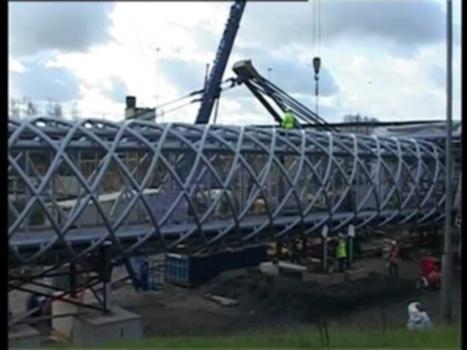 SH Structures - M8 Footbridge Lift:M8 Footbridge Harthill, Scotland.
The bridge was successfully lifted during a single overnight road closure, which significantly reduced the overall costs and minimized the impact on the users of the existing services and the M8, Scotland's busiest motorway.