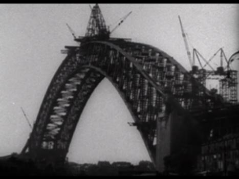 Sydney's Harbour Bridge:Made by the Cinema Branch 1933. Directed by Lyn T Maplestone. Officially opened on 19 March 1932, the Sydney Harbour Bridge was a massive engineering undertaking that transformed the city. This short film documents the construction of one of the world's great landmarks in its various stages, and provides a fascinating glimpse of life around Sydney Harbour and Circular Quay in the twenties and thirties. The Cinema Branch regularly filmed events of special interest to the nation. There were at least 3 different films on the progress of the bridge. Sydney's Harbour bridge was filmed over several years and edited to celebrate the opening.