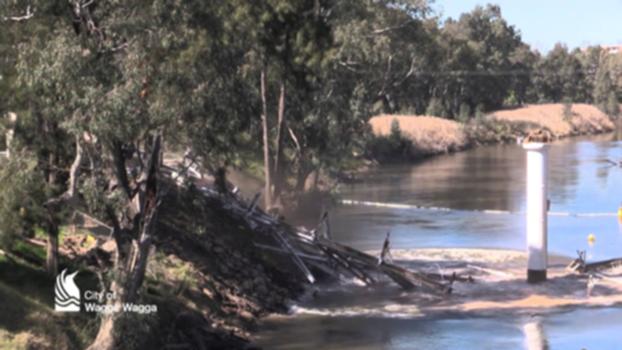 Induced collapse of the Hampden Bridge, Wagga Wagga:On 20 August 2014, the Hampden Bridge located over the Murrumbidgee River at Wagga Wagga was demolished using the induced collapse method.
The three span Allan type truss bridge was built in 1895.
The bridge was closed to traffic in October 1995 by the Roads and Traffic Authority, just short of its 100th anniversary, when the adjacent Wiradjuri Bridge was opened.
The Hampden Bridge was closed to pedestrians in 2006.
Wagga Wagga City Council resolved in 2013 to demolish the bridge.
More information is available at: www.wagga.nsw.gov.au/hampdenbridge