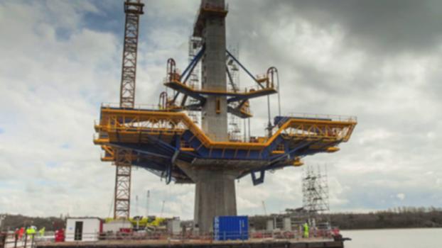 Mersey Gateway - lifting the form traveller at the south pylon - 8 April 2016:Watch our construction teams use a hydraulic system to lift the two 270-tonne form travellers into place at the south pylon in the Mersey estuary.