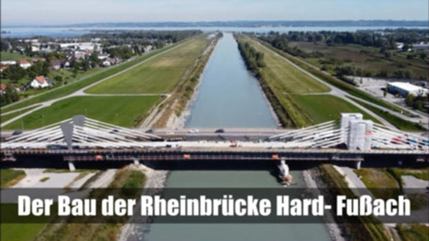 Der Bau der Rheinbrücke Hard - Fußach: Der Alpenrhein, der Abschnitt des Rheins von Reichenau im Schweizer Kanton Graubünden bis zur Einmündung in den Bodensee. Aufgrund des hohen Schadenspotentials bei einem möglichen Jahrhunderthochwasser soll die maximale Durchflussmenge im Rahmen des Hochwasserschutzprojektes Rhesi von 3.100 auf 4.300 m³/s ausgebaut werden. Das Hochwasserschutzprojekt Rhesi macht das St. Galler und Vorarlberger Rheintal für ca. 300.000 Bewohner sicherer. Mit der Umsetzung des Projekts Rhesi werden die größtenteils mehr als 100 Jahre alten Hochwasserdämme umfassend saniert oder neu gebaut und die Sohle abgesenkt. Die 255 m lange Rheinbrücke zwischen Hard und Fußach ist zur Sicherstellung der primären Rahmenbedingungen für den Hochwasserschutz ebenfalls anzupassen. Die verbesserte Hochwassersicherheit wird einerseits mit einem Anheben der Gradiente im Vergleich zum Bestand um bis zu 2,5 m erzielt. Andererseits werden die drei neuen Pfeiler nicht im Mittelgerinne des Rheins, sondern im Rheinvorland situiert. Der Ersatzneubau der Rheinbrücke Hard - Fussach wurde im Jahr 2020 in Angriff genommen. Die Verkehrsfreigabe erfolgte im November 2022. Die neue Rheinbrücke wurde als eine 4-feldrige Stahlverbundbrücke mit aufgelöster Seilkonstruktion geplant, welche über drei neue Pfeiler verfügt, wovon zwei der Masten die Seilkonstruktion tragen. Das Tragwerk, ein 4-Feldträger weist Stützweiten von 50 m, 125 m, 50 m und 30,6 m auf. Daraus resultiert eine Gesamtstützweite von 255,60 m. Die Breite der Brücke beträgt 24,37 m.