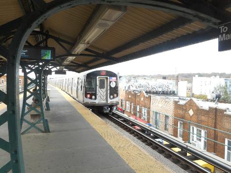 A Lower Manhattan-bound R160 train leaves the Norwood Avenue Elevated Railway station on the BMT Jamaica Line in Cypress Hills section of Brooklyn