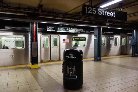 A Brooklyn-bound 5 train at the 125th Street IRT Lexington Avenue station in East Harlem, Manhattan.