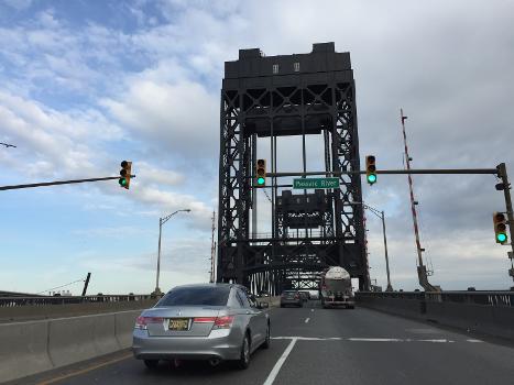 Lincoln Highway Passaic River Bridge:View east along Communipaw Avenue (northbound on U.S. Route 1 Truck and U.S. Route 9 Truck) crossing the Passaic River lift bridge from Newark to Kearny, New Jersey