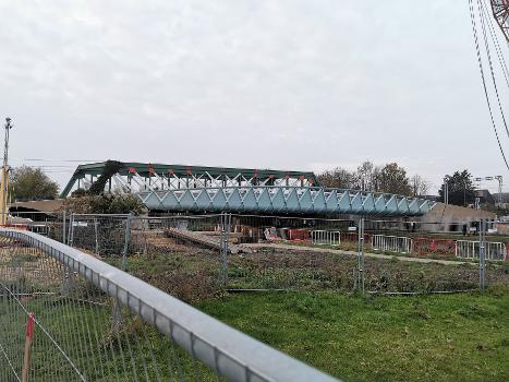 Brand-new Chesterton Abbey bridge in Cambridge, UK for cycling and pedestrians : Existing railway girder bridge in background. Photographed on same day after being craned into position.