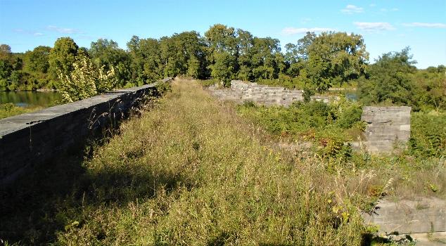 Ruins of the Schoharie Creek Aqueduct : Ruins of the Schoharie Creek Aqueduct of the Enlarged Erie Canal, built from 1839 to 1841, and used from 1845 to 1916. The aqueduct had 14 arches spanning 624 feet. This image shows the top of the remaining aqueduct..