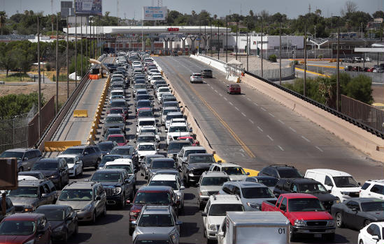 U.S. Customs and Border Protection officers screen border crossers as they arrive at the Laredo ports of entry in Laredo, Texas