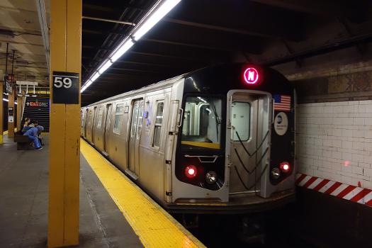 A Coney Island-bound N local train leaving the southbound platform of the 59th Street BMT Fourth Avenue Line station in Sunset Park, Brooklyn