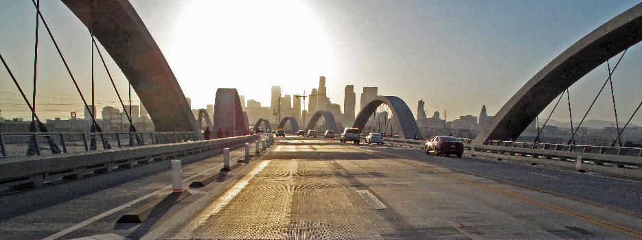 Looking backward from the 6th Street Bridge towards Downtown Los Angeles and the setting sun.