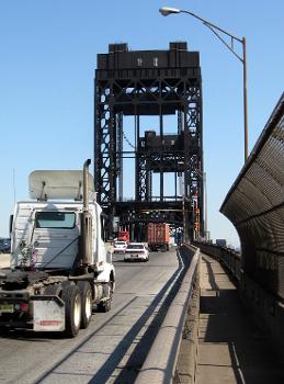 Lincoln Highway Passaic River Bridge:Lookng east at U.S. Route 1/9 Truck leaving Ironbound over a lift bridge over the Passaic river on a sunny midday